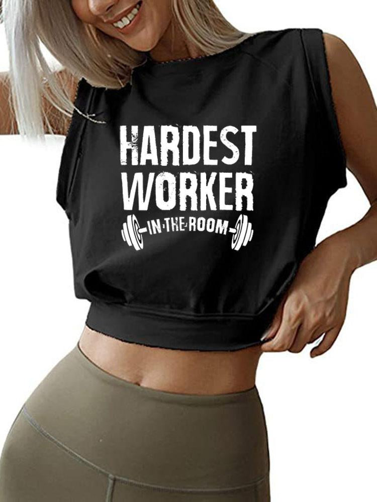 HARDEST WORKER IN THE ROOM SLEEVELESS CROP TOPS