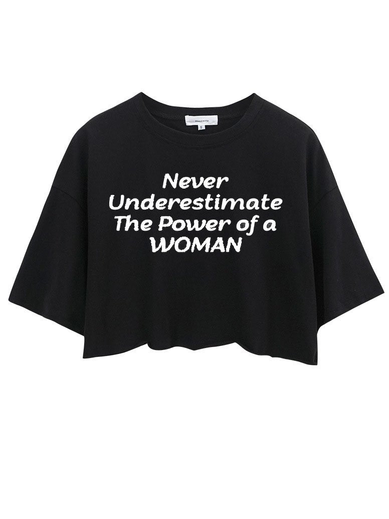 Never Underestimate The Power Of A Woman CROP TOPS